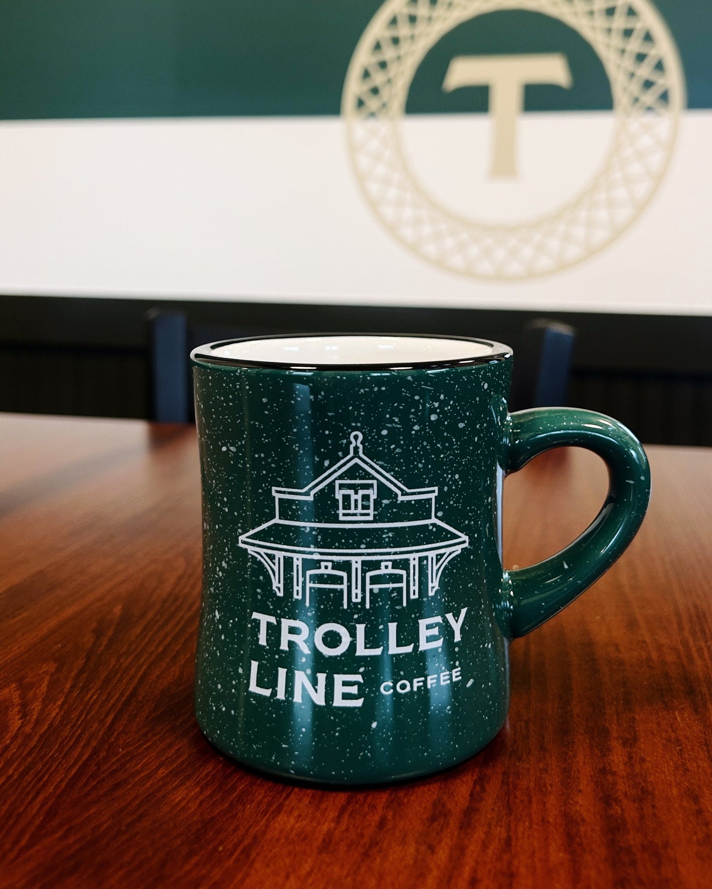 Green mug on table